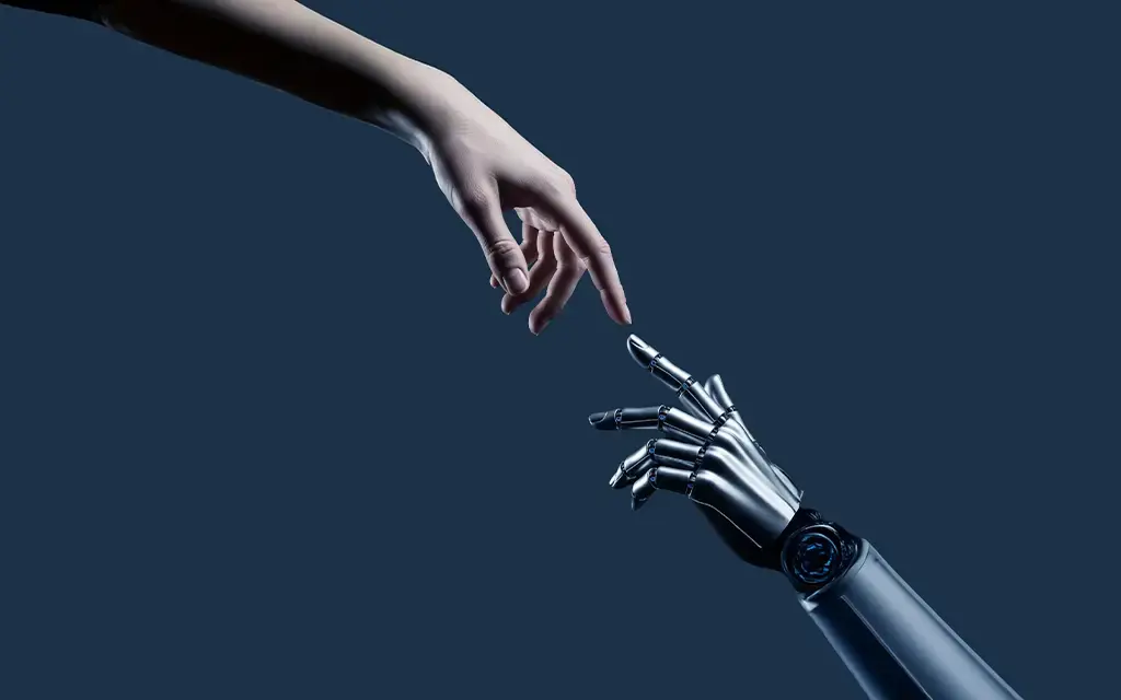 Human hand reaching toward robotic hand symbolizing AI integration in financial services operations.