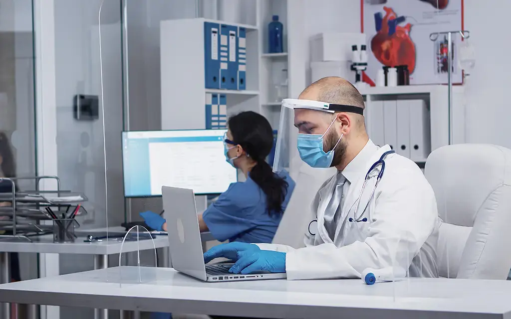 doctor-typing-on-laptop-insight