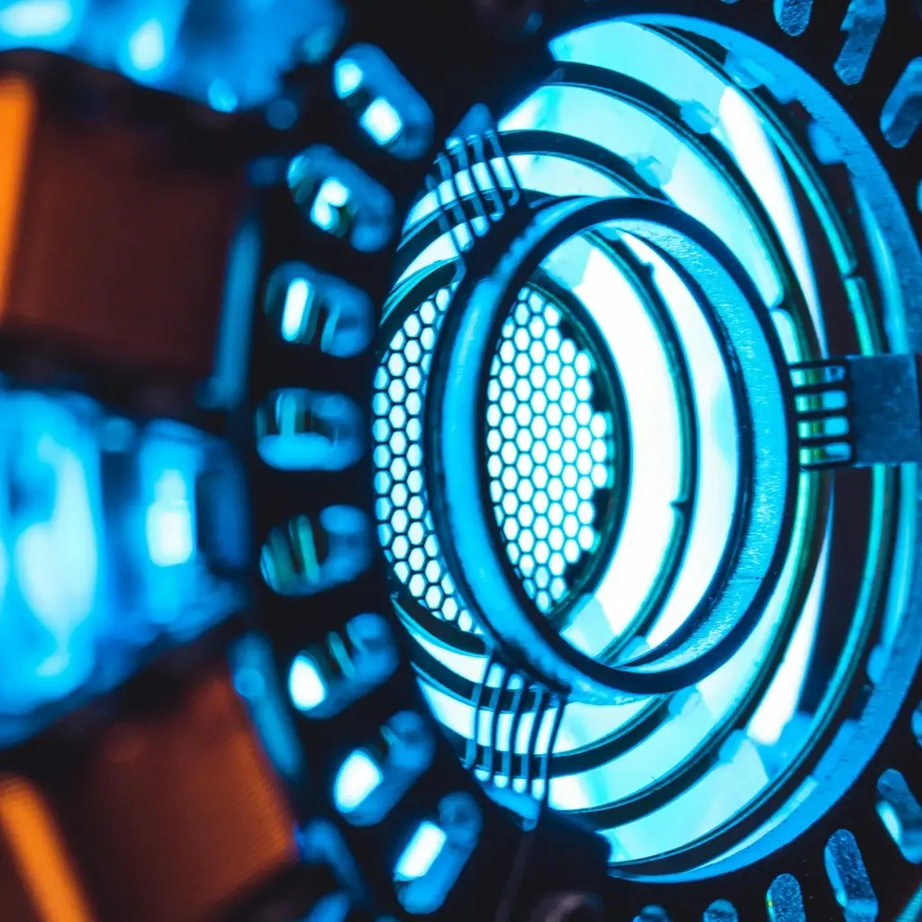 Glowing circular compute core with blue energy rings and copper modules, symbolizing high-performance data processing