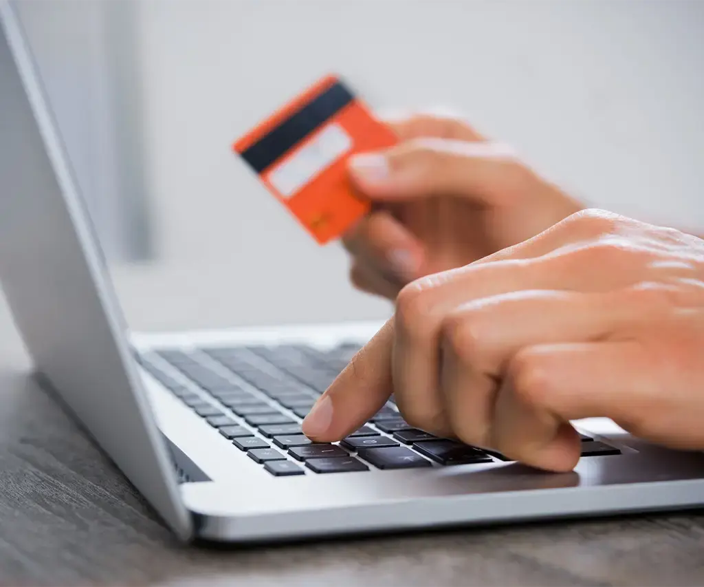 closeup-hand-man-typing-credit-card-carousel-case-studies-expanded