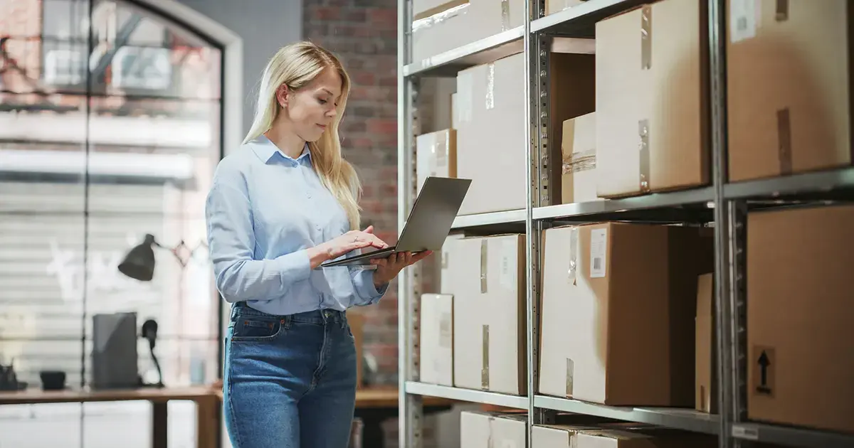 woman-digital-logistics-near-boxes-featured-image