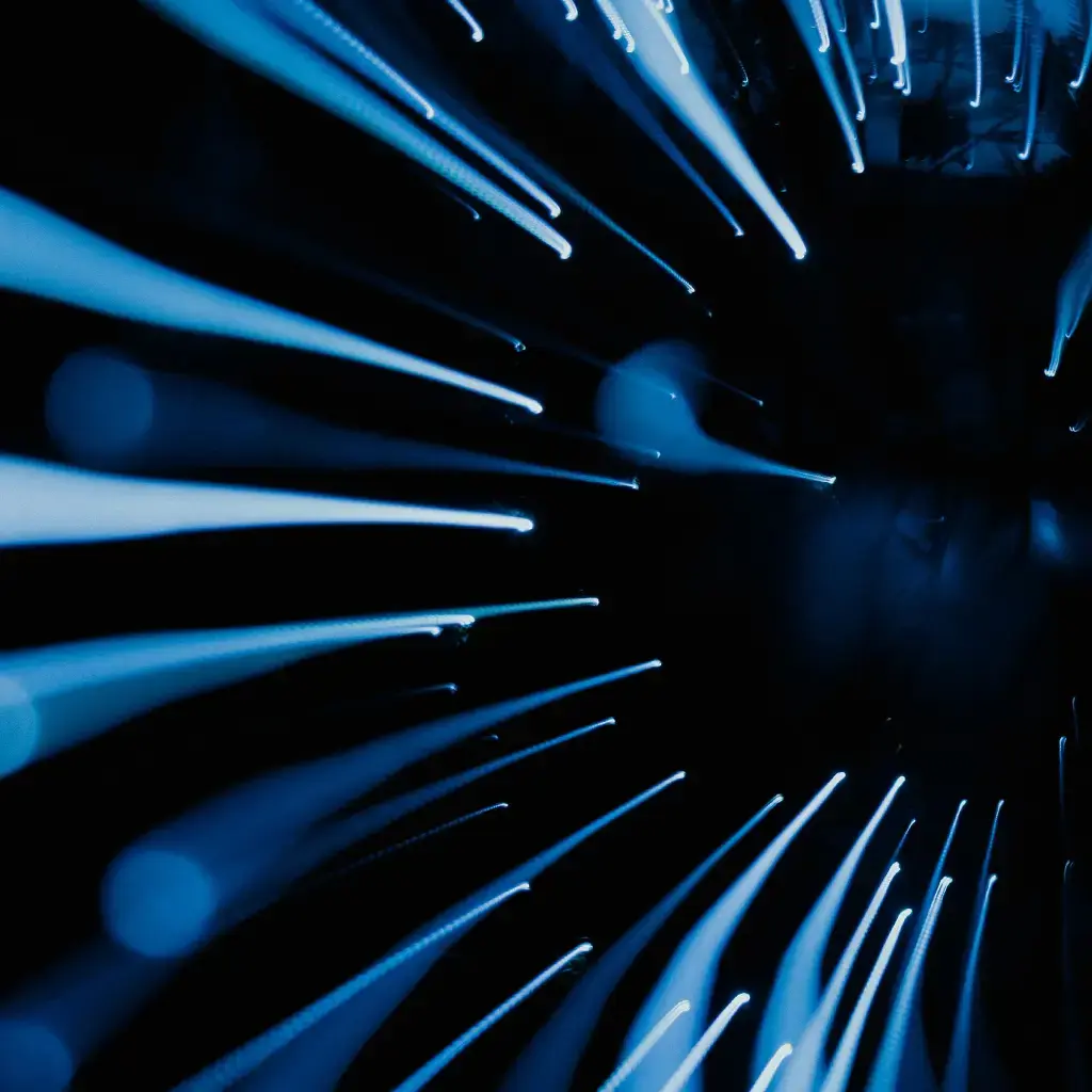 Abstract blue light trails representing AI-driven data flow and digital transformation roadmap