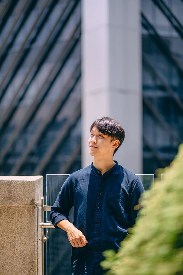 modern office team member enjoying sunlight