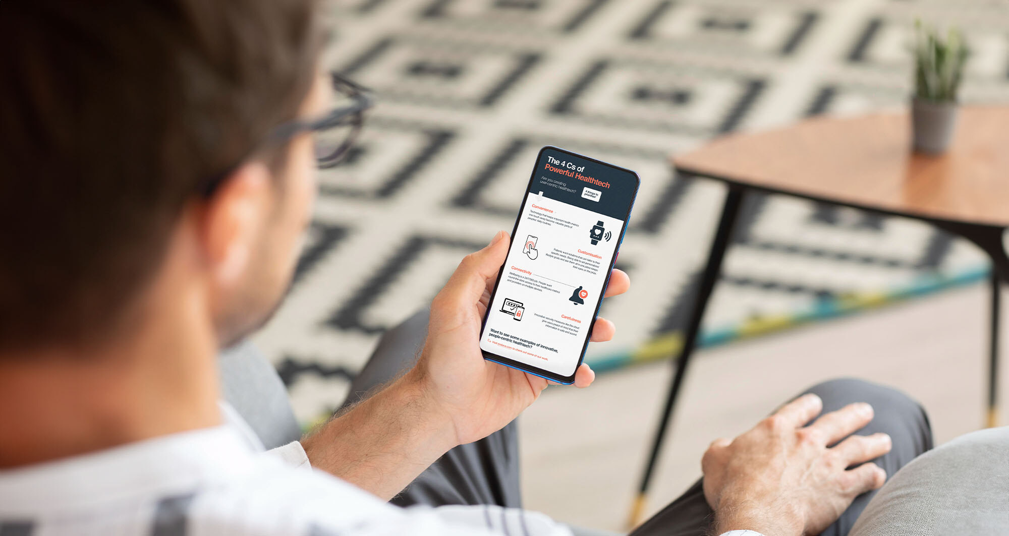 man looking at healthcare insights on his phone