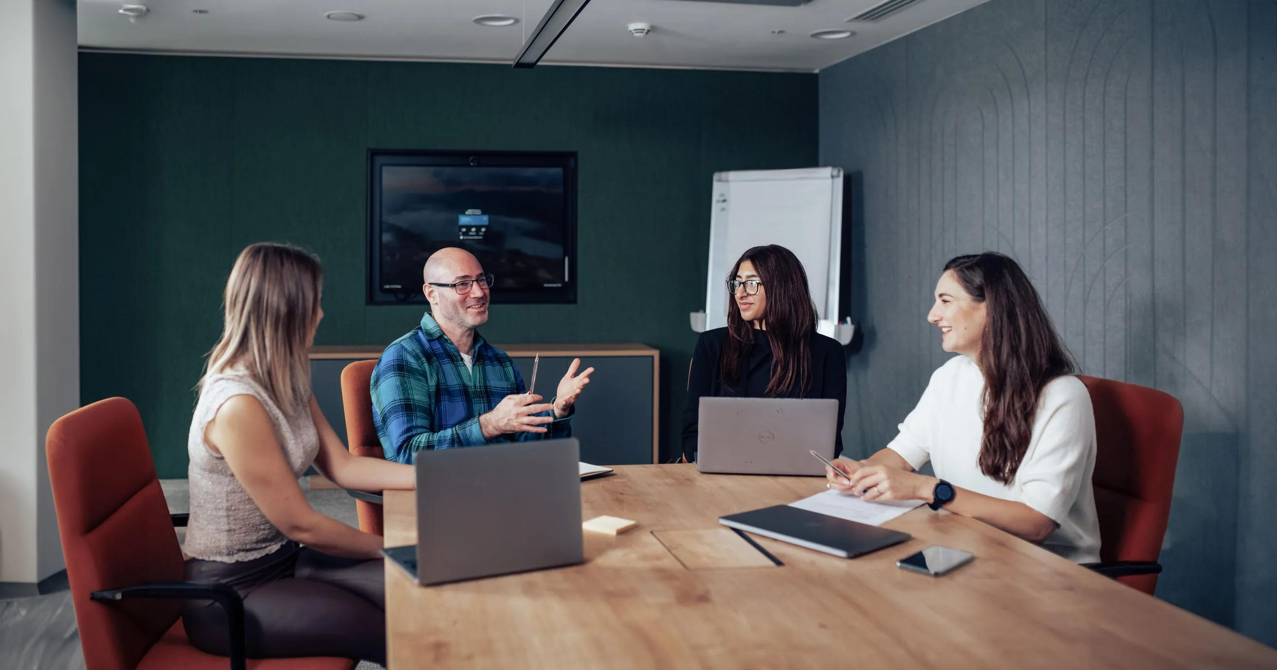 People in a meeting discussing