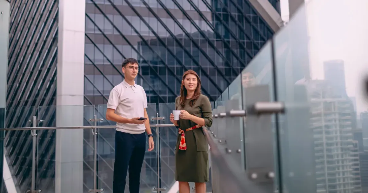 two people outside enjoying the view