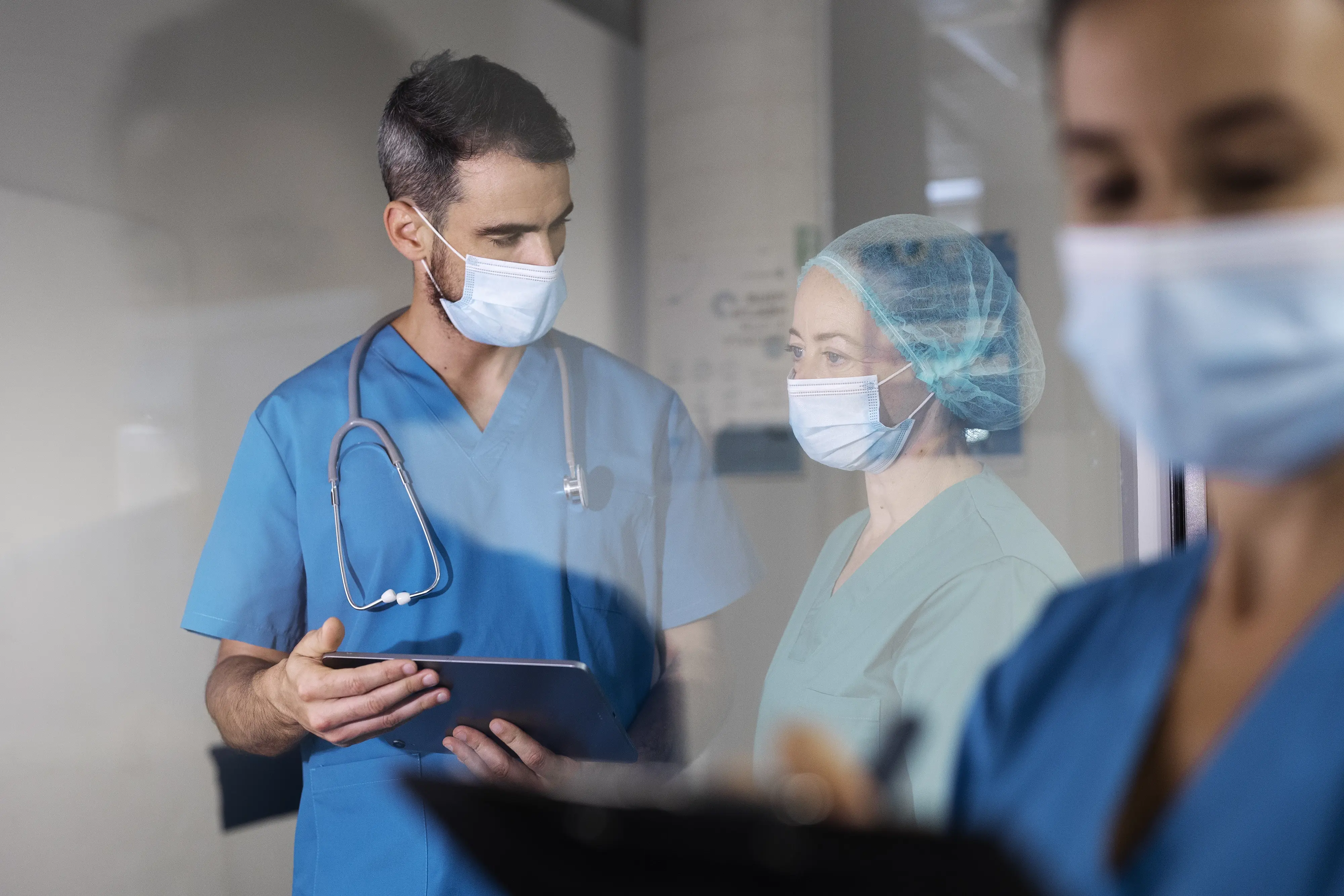 Healthcare professionals reviewing medical records