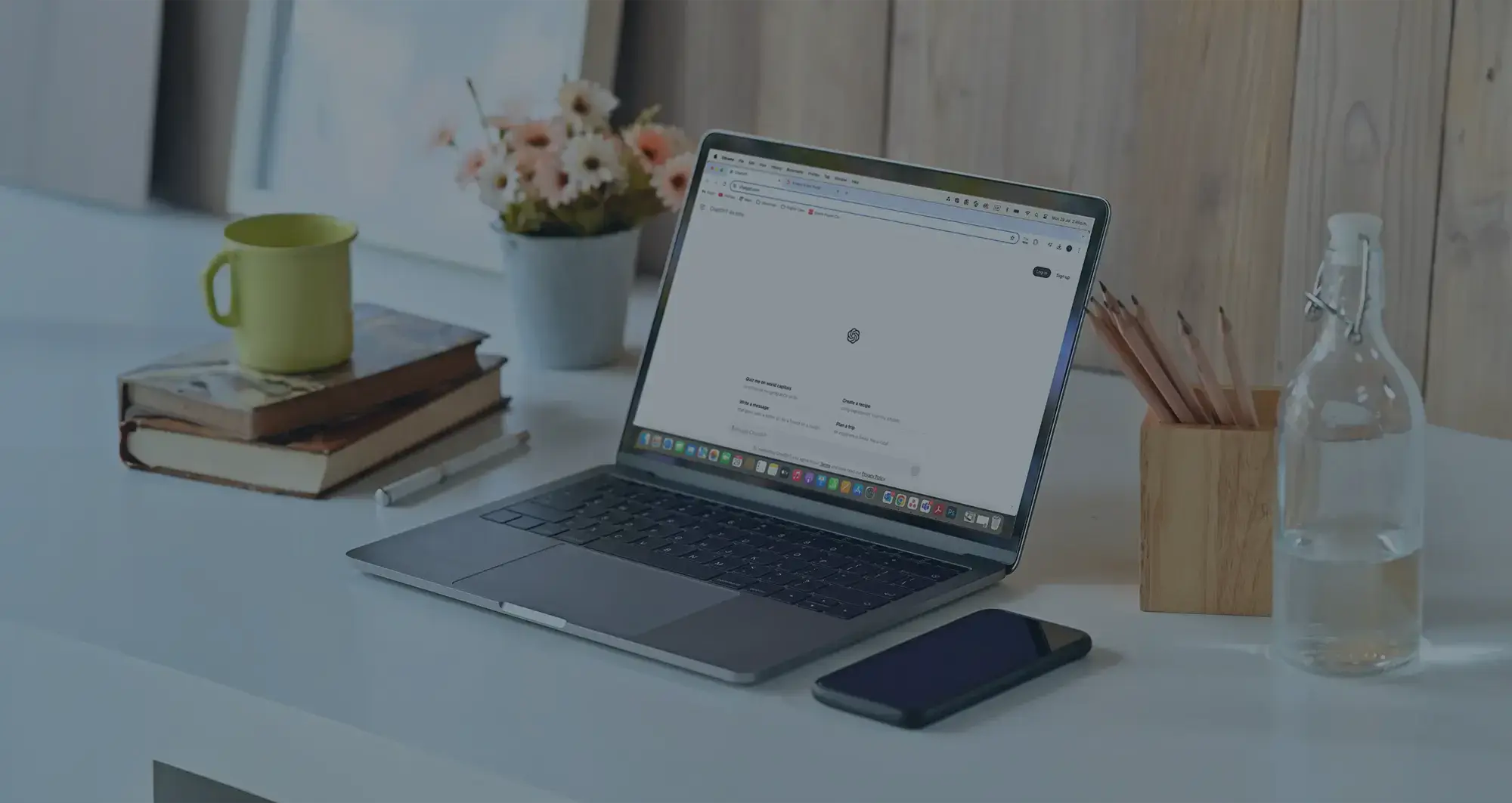 laptop open and displaying ChatGPT website