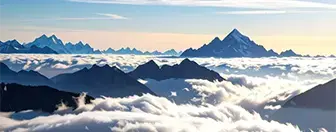clouds migrating over mountains