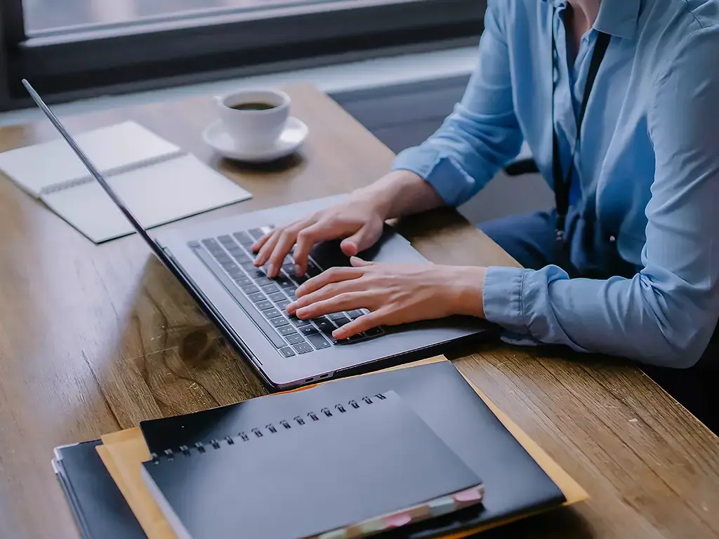 woman-working-on-laptop-marketing-hero-1